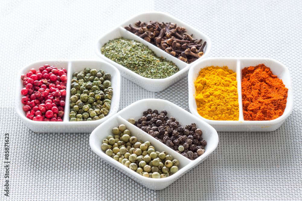 Colorful herbs,spices and aromatic ingredients on modern table.