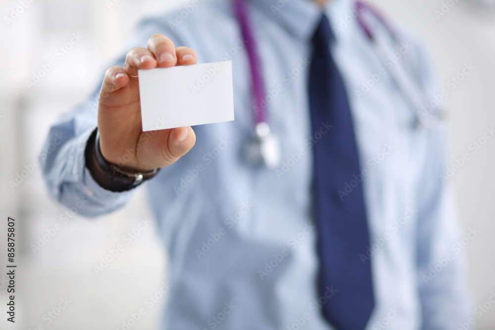 Doctor holding blank business card Doctor holding blank business card