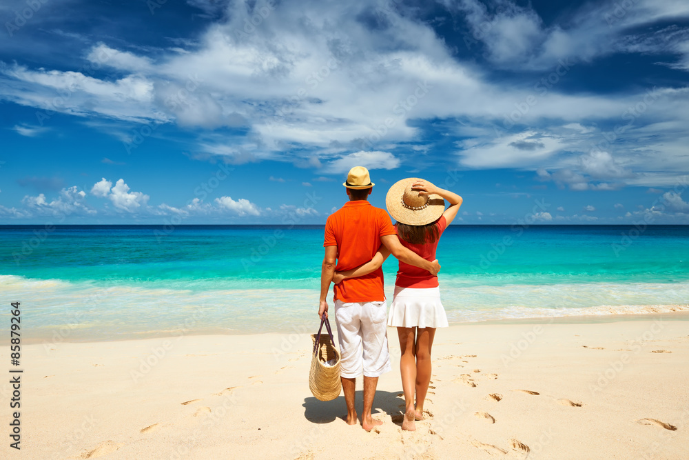 Couple on a beach at Seychelles Couple on a beach at Seychelles