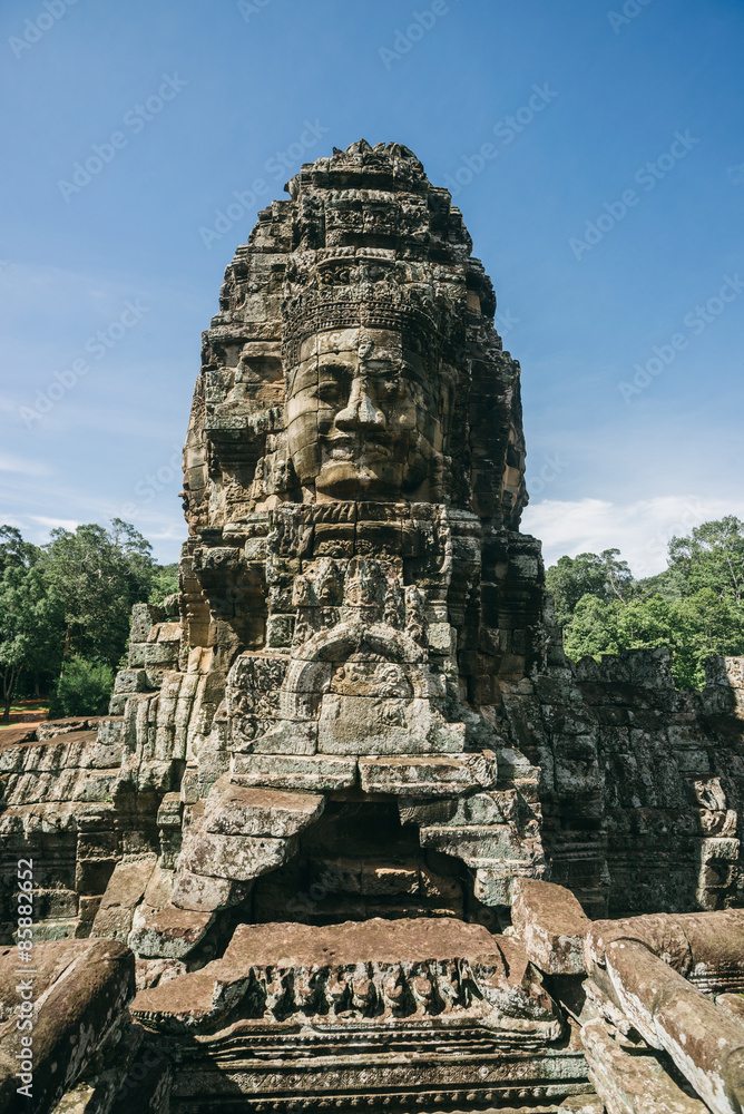 A giant stone statue from the ancient temples of Angkor, which is one of the most important archaeological sites in the world.