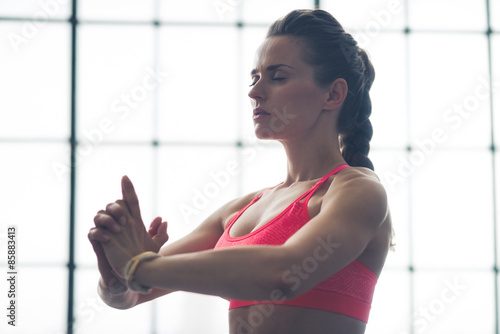 Woman doing yoga pose upper body only Free Download Woman doing yoga pose upper body only - GFXLoad