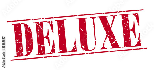 deluxe red grunge vintage stamp isolated on white background