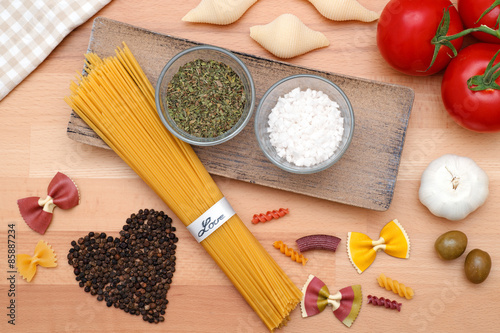 different types of pasta and other ingredients for an italian meal