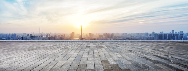 Panoramic skyline and buildings with empty wooden board