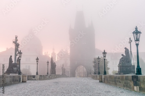 Photography Charles Bridge in Prague at foggy morning