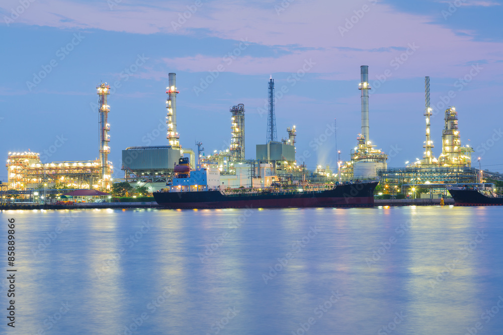 Oil refinery river front before sunrise Bangkok Thailand Oil refinery river front before sunrise Bangkok Thailand