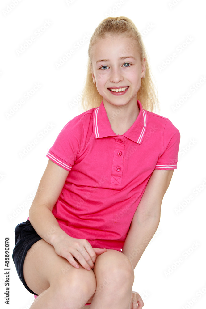 Cheerful teenage girl in t-shirt and shorts, close-up Cheerful teenage girl in t-shirt and shorts, close-up