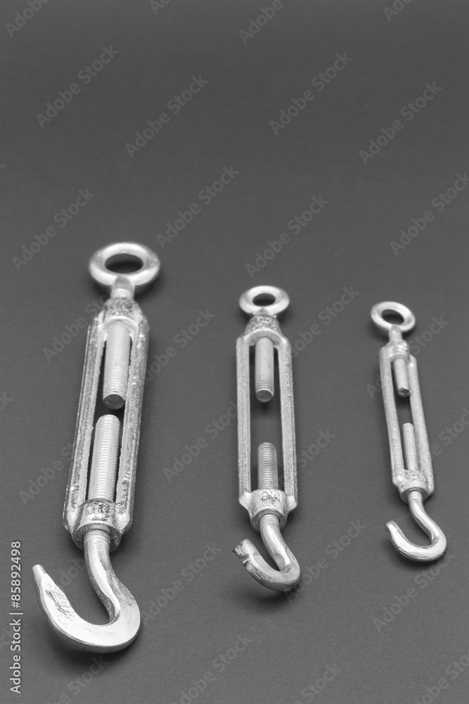 Screw tensioner hook and eyelet Screw tensioner hook and eyelet