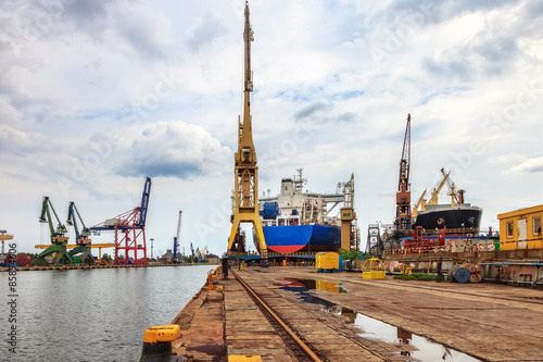 Ships and cranes in shipyard of Gdansk, Poland. photo