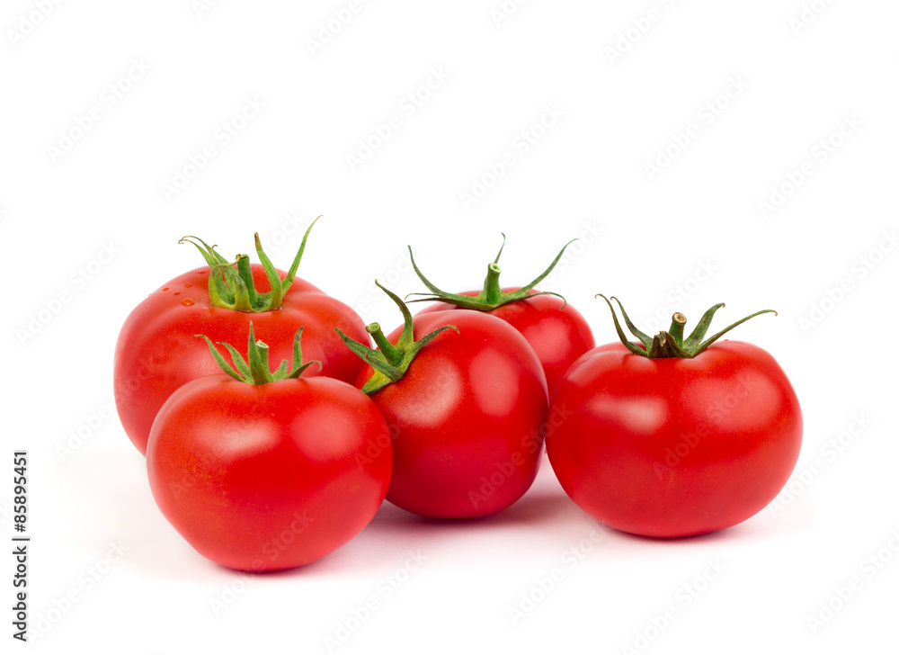Fresh tomatoes with green leaves isolated on white background Fresh tomatoes with green leaves isolated on white background