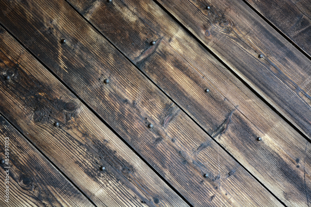 Old black rustic wood. Picture can be used as a background Old black rustic wood. Picture can be used as a background