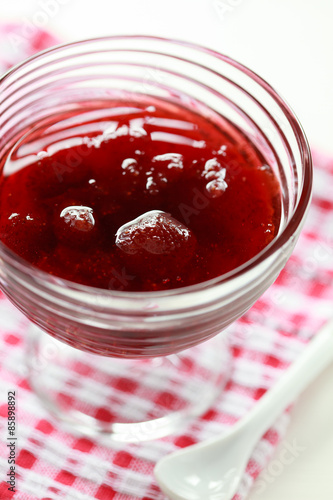 Wallpaper Mural Homemade Strawberry jam in a glass vase on white background Torontodigital.ca