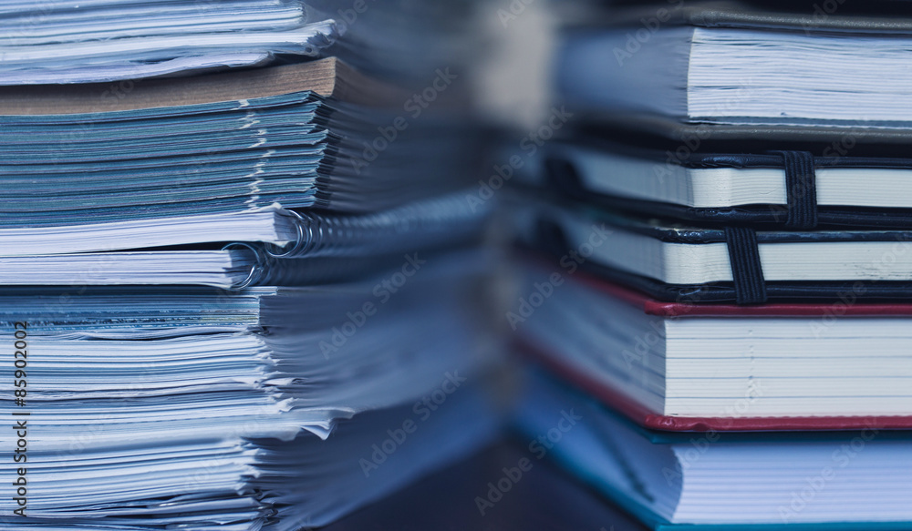 Accounting and taxes. Large pile of magazine and books Accounting and taxes. Large pile of magazine and books