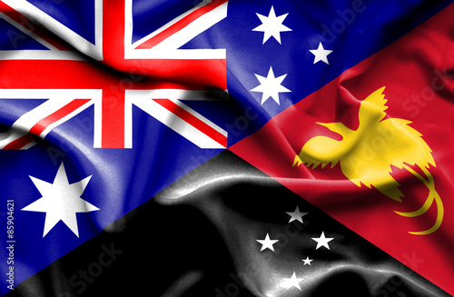 Waving flag of Papua New Guinea and Australia