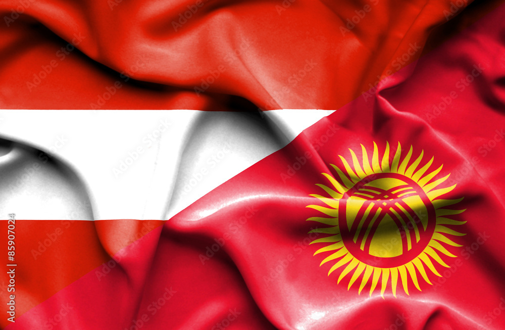 Waving flag of Kyrgyzstan and Austria