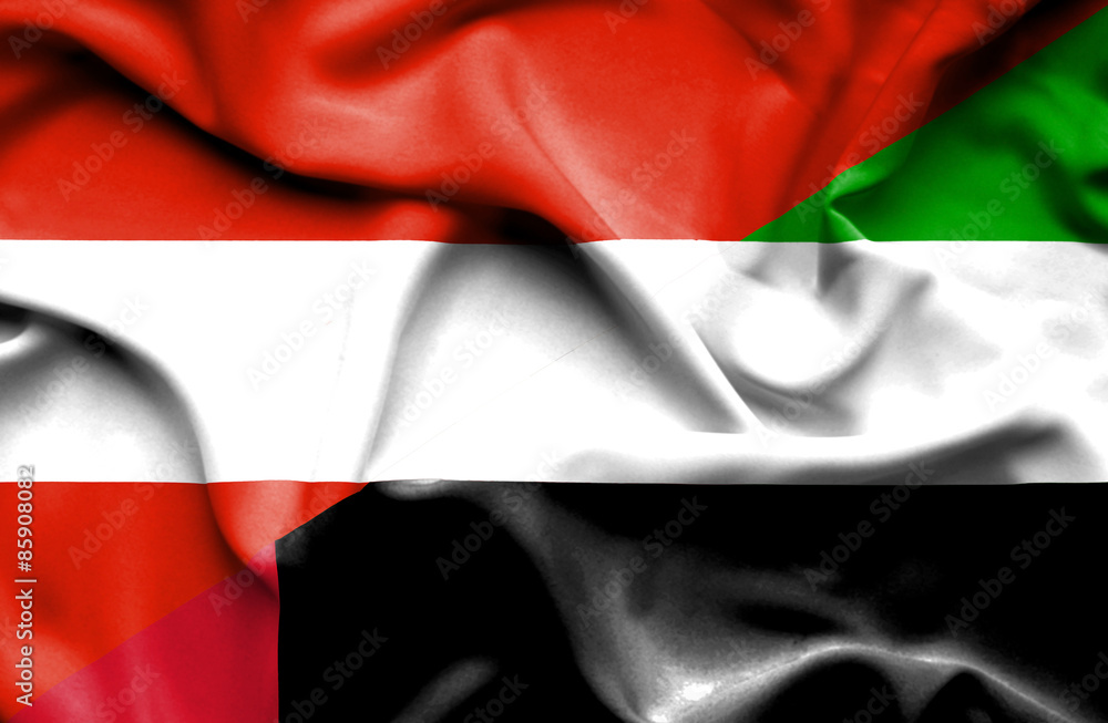 Waving flag of United Arab Emirates and Austria