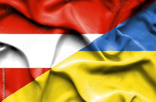 Waving flag of Ukraine and Austria