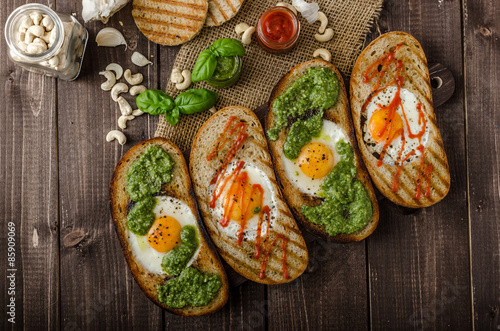 Vatiations of fried eggs inside bread