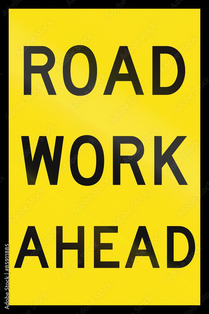 An Australian temporary roadwork sign - Road work ahead An Australian temporary roadwork sign - Road work ahead