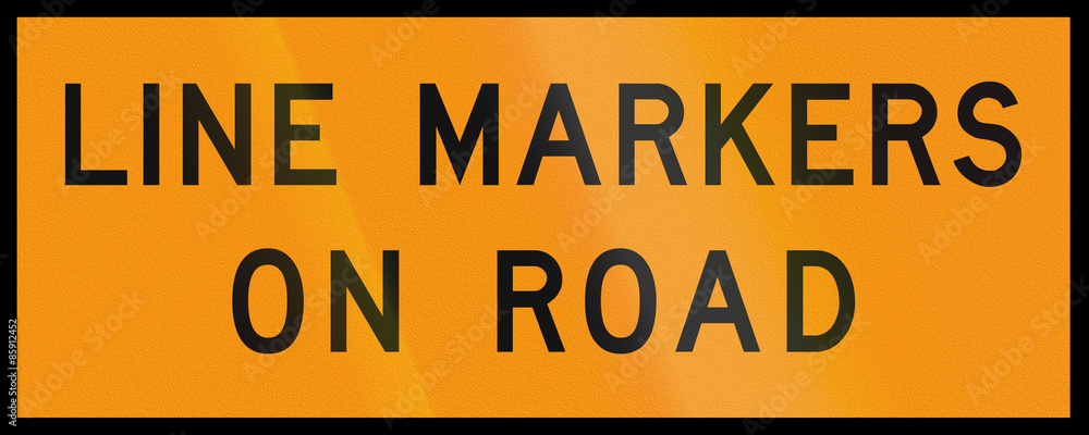An Australian temporary roadwork sign - Line markers on road An Australian temporary roadwork sign - Line markers on road