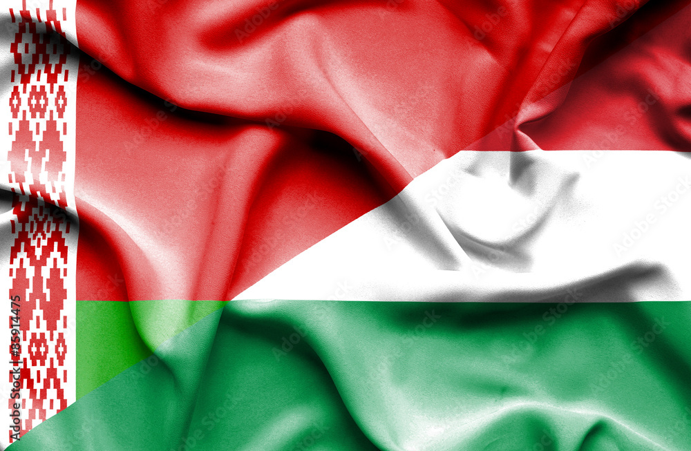 Obraz premium Waving flag of Hungary and Belarus