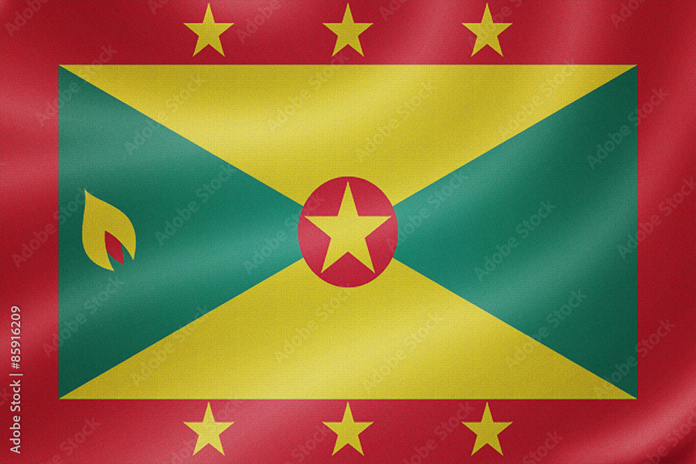 Grenada flag on the fabric texture background Grenada flag on the fabric texture background