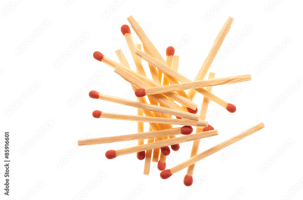Pile of red wooden matches isolated on white background Pile of red wooden matches isolated on white background