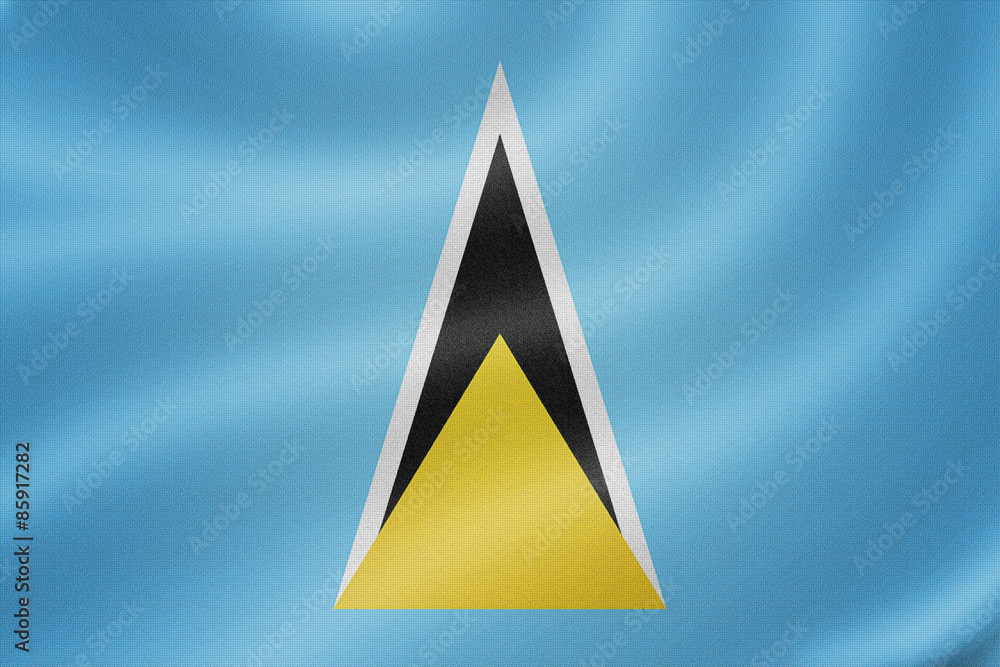Saint Lucia flag on the fabric texture background Saint Lucia flag on the fabric texture background