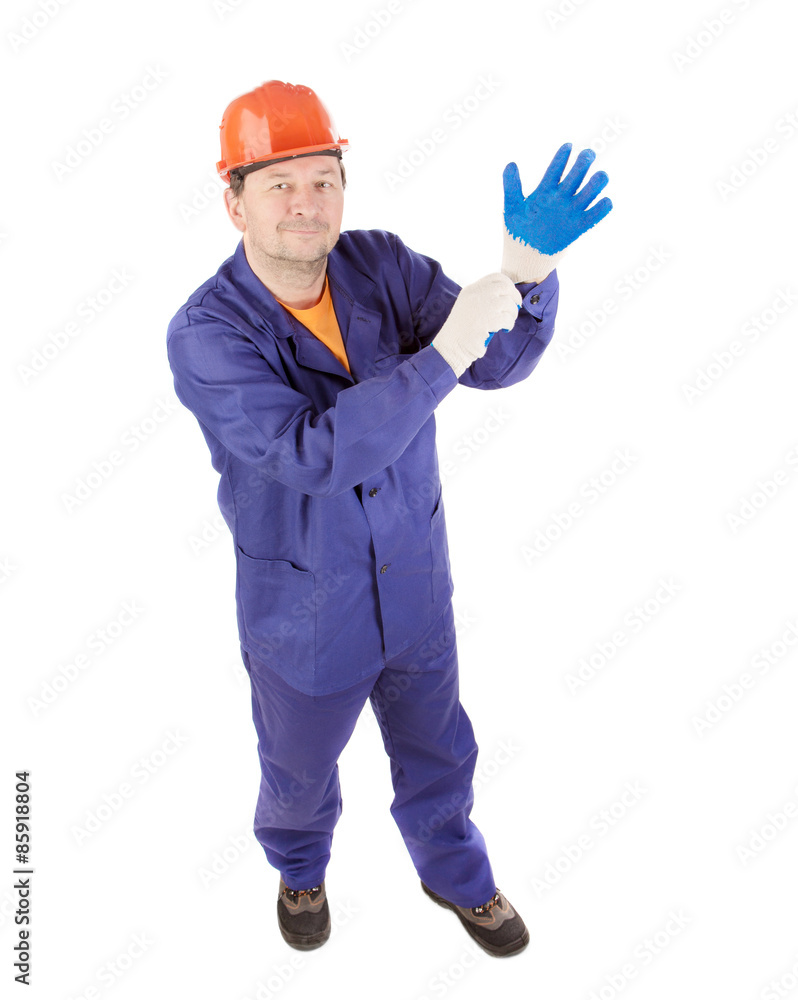 Worker put on the glove. Worker put on the glove.