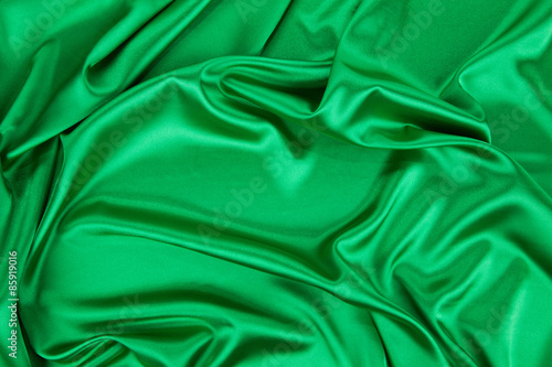 Green silk cloth some soft folds.