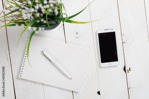 Simple workspace on wooden table
