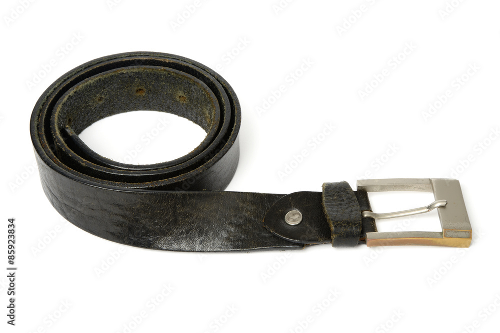 Detail of Black colored old belt and buckle Detail of Black colored old belt and buckle