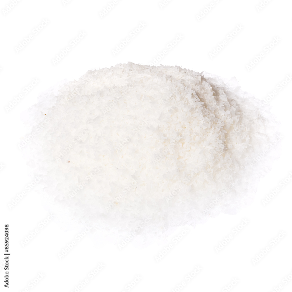 Close up of a coconut and grounded coconut flakes. Close up of a coconut and grounded coconut flakes.