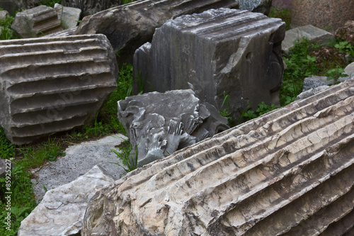 Various pieces of excavated ancient roman coumns photo