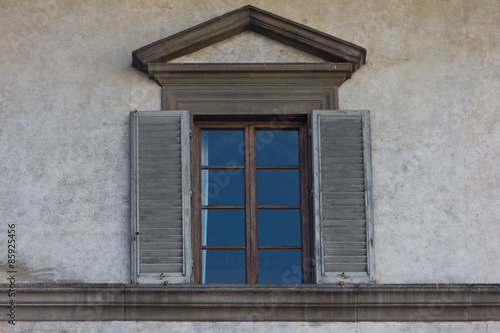 Rustic window in a building in Siena