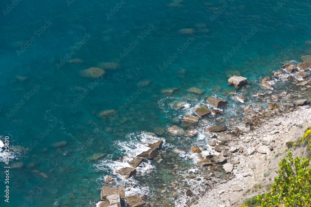 Rocky beach and clear waters of Cinque Terre