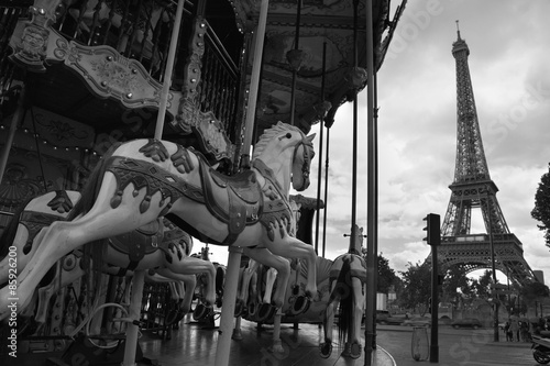 Image of vintage carousel near Eiffel tower in Paris, France