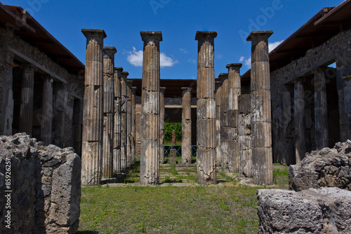 Stone columns in the main courtyard of a house in Pompeii