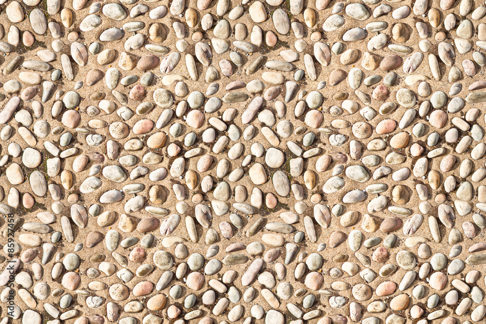 Fototapeta premium white pebble stones on concrete texture seamless endless pattern