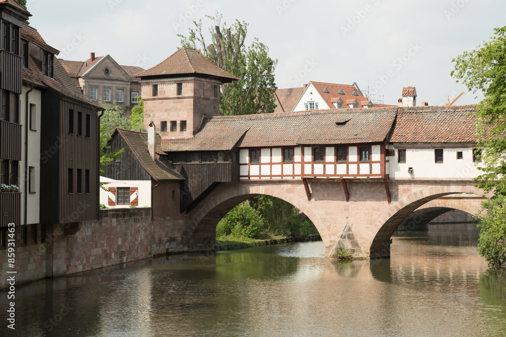 the wooden Henkersteg pedestrian bridge on the river Pegnitz in Nuremberg, Germany