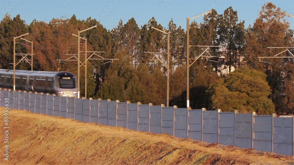 Gautrain, high speed train traveling from OR Tambo International Airport to Pretoria, South Africa moving from right to left. Gautrain, high speed train traveling from OR Tambo International Airport to Pretoria, South Africa moving from right to left.