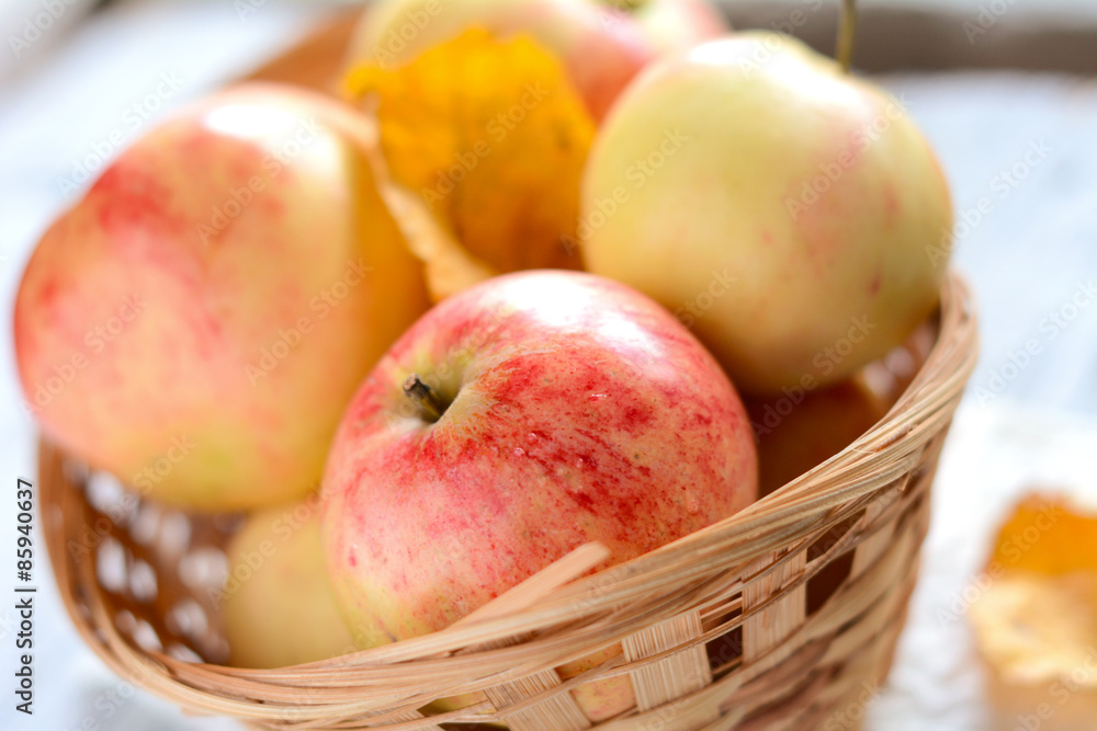 Freshly picked autumn apples in basket. Rustic seasonal still life shot Freshly picked autumn apples in basket. Rustic seasonal still life shot