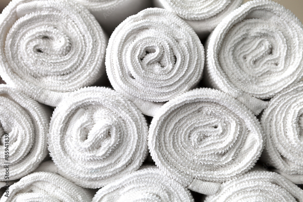 rolled white body towels, beautiful background Stock Photo