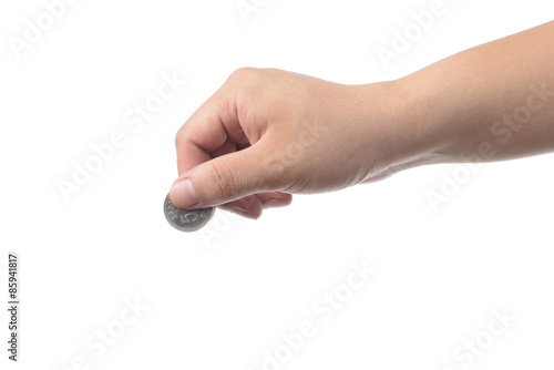 hand holding a coin