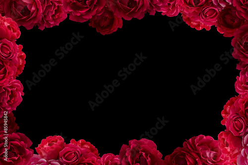 Fototapeta Naklejka Na Ścianę i Meble -  Frame with bush of red rose flowers background isolated on black