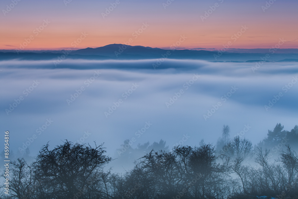 Sunset over the Fogy Landscape