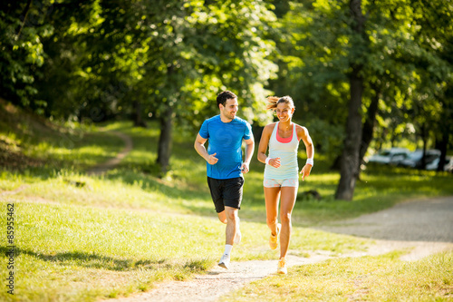 Young couple running