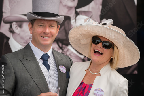 Photos Couple at Royal Ascot laughing at camera