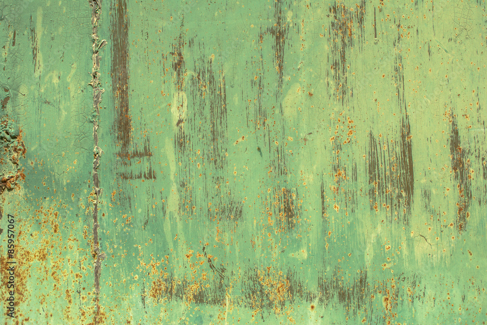 surface of rusty iron with remnants of old paint background