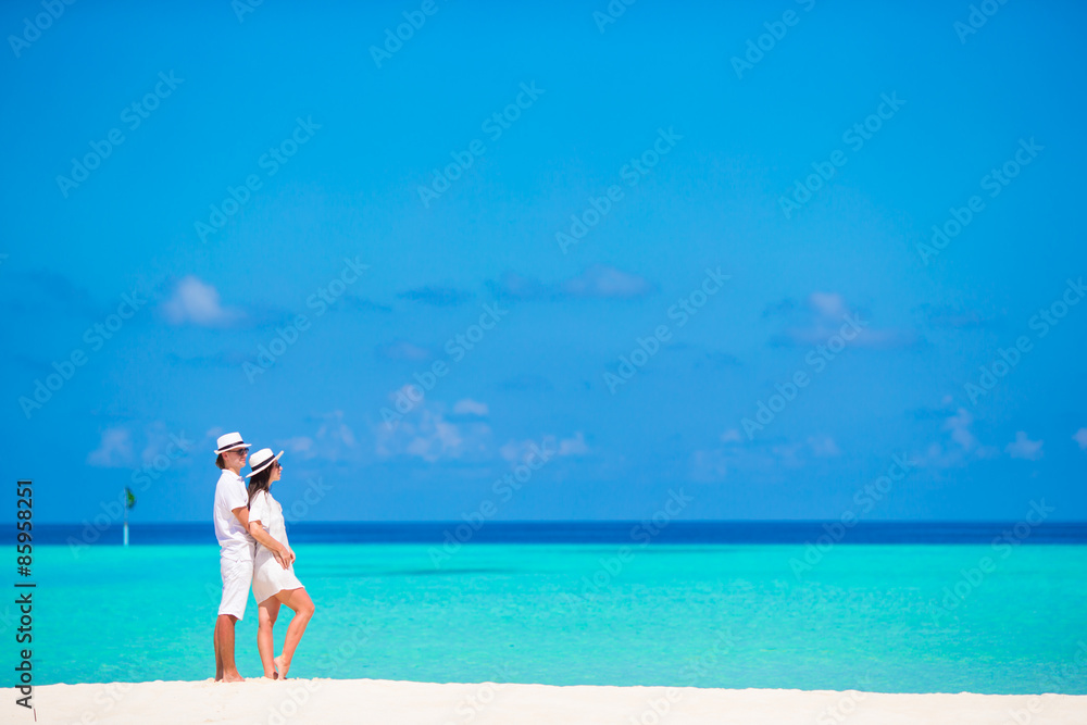 Young happy couple during beach tropical vacation